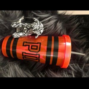 Pink tumbler with mini dog